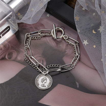Silver-Plated Coin Layered Bracelet, silver bracelet for women, dainty minimalist design, side view