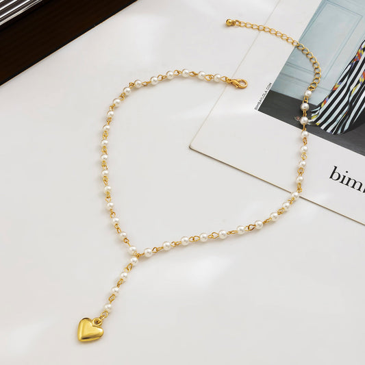Pearl and 18K Gold-Plated Heart Lariat Necklace, gold pendant necklace for women, vintage-inspired design, front view