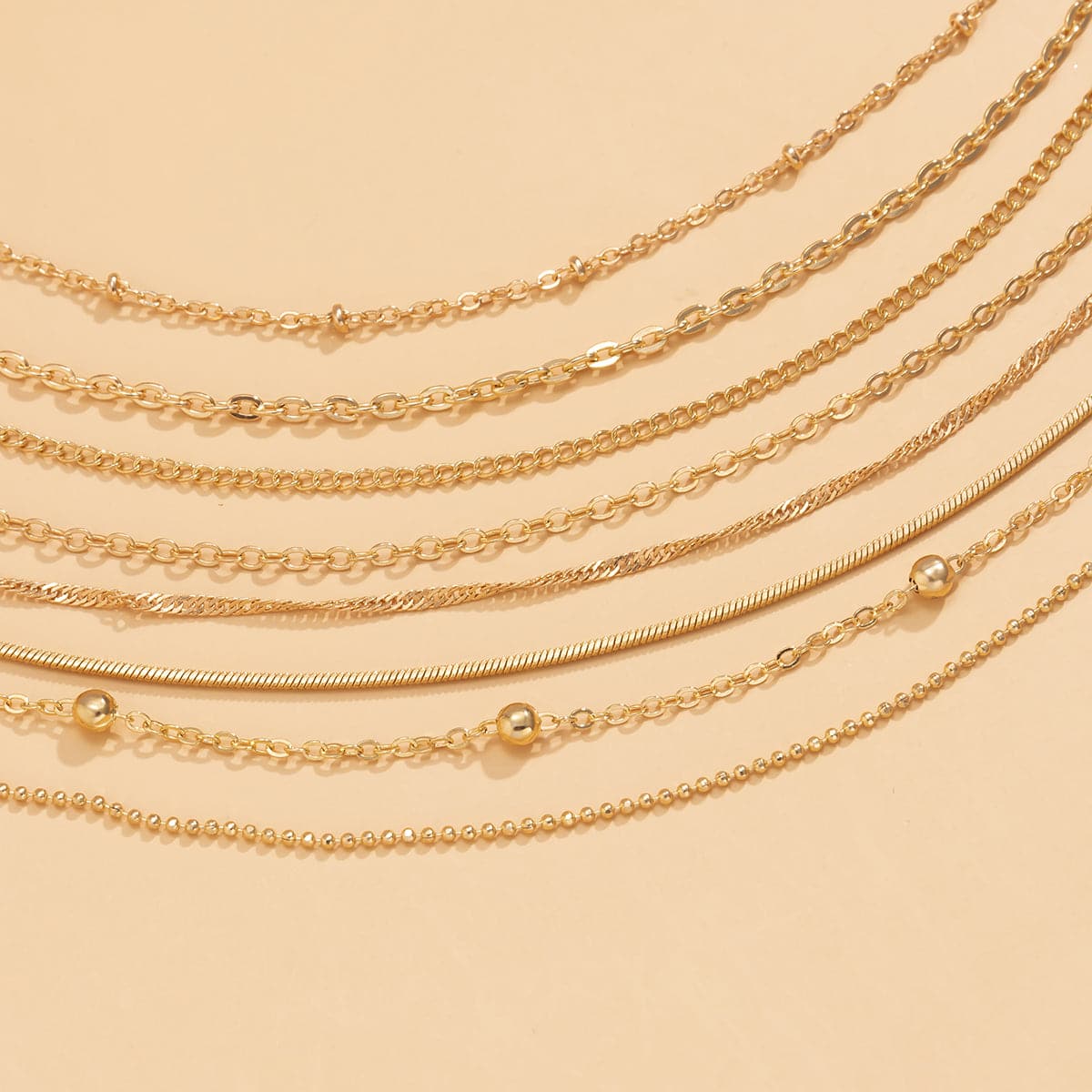 Stunning 18K gold-plated bead chain necklace set with multiple strands, designed to elevate your jewelry collection.