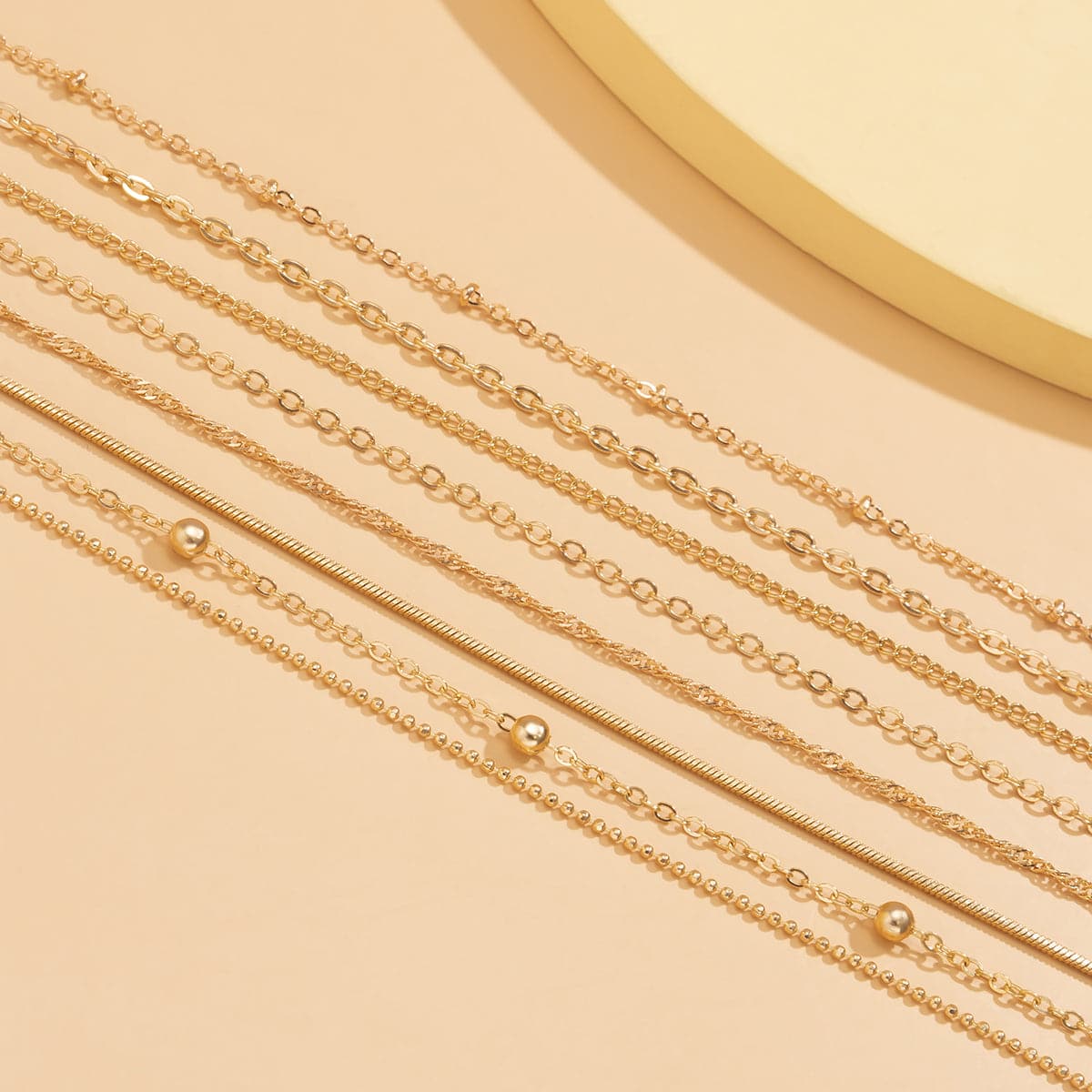 Exquisite 18K gold-plated bead chain necklace set with multiple strands, a must-have accessory for any fashion lover.
