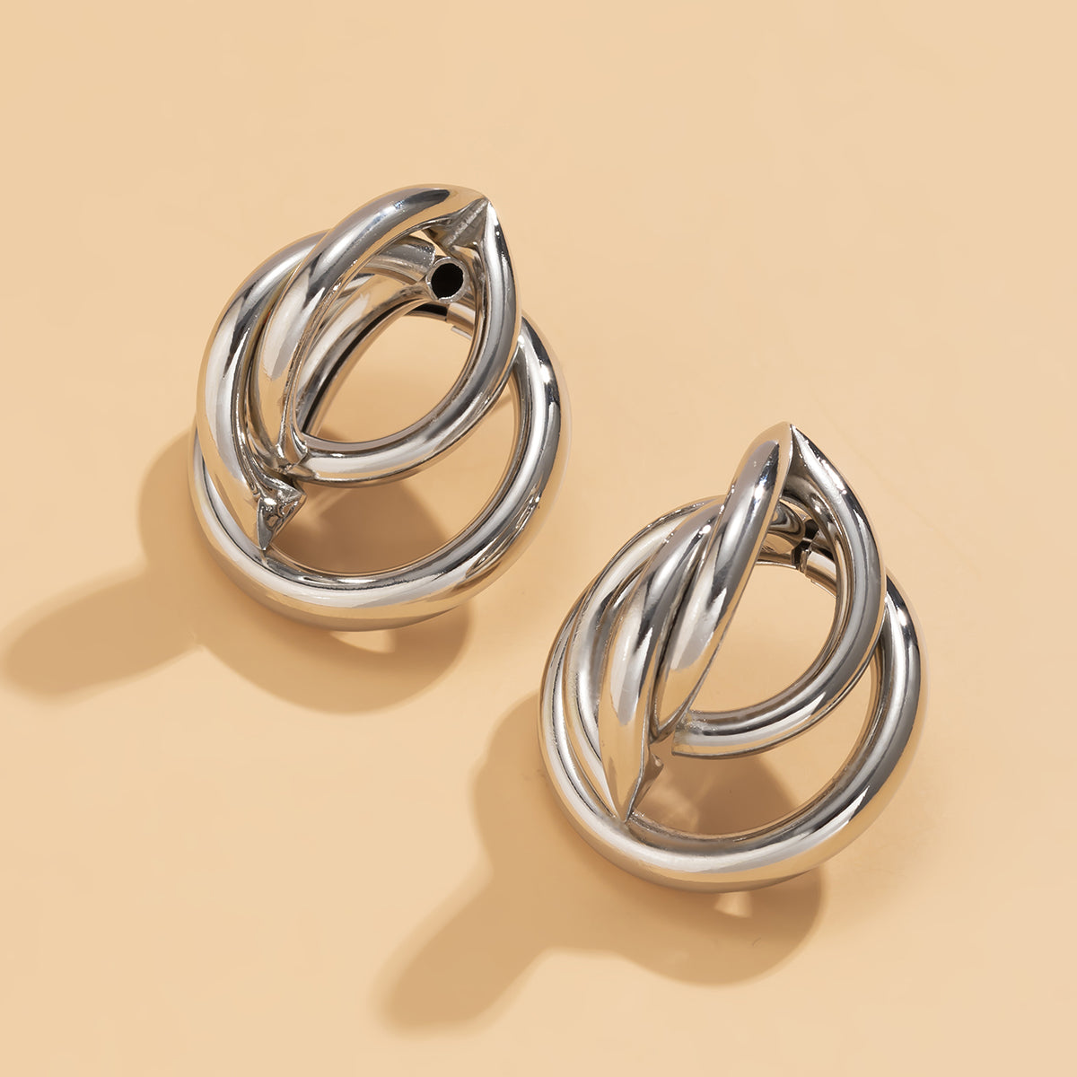 Silver-Plated Interlocking Rings Stud Earrings, silver stud earrings for women, everyday style, lifestyle look