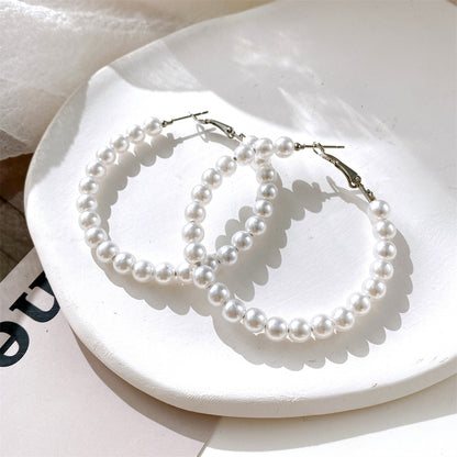 Pearl and Silver-Plated Hoop Earrings, botanical inspired, side view