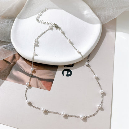 Pearl and Silver-Plated Station Chain Necklace, silver pendant necklace for women, botanical inspired, detail close-up