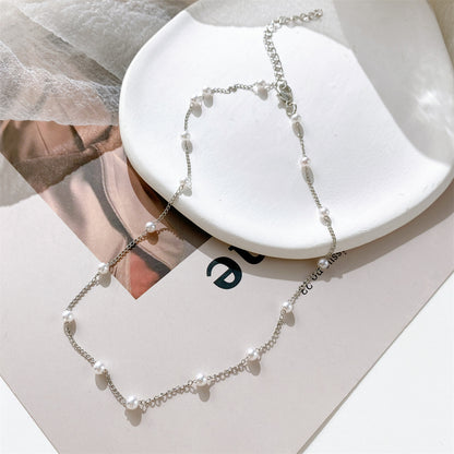 Pearl and Silver-Plated Station Chain Necklace, silver pendant necklace for women, botanical inspired, front view