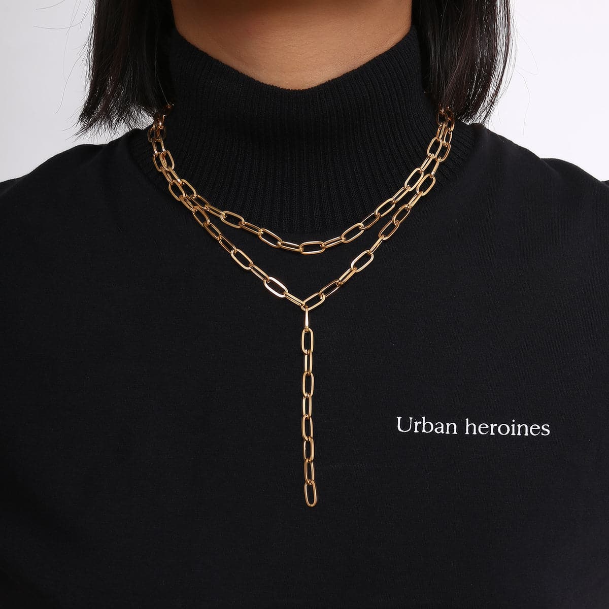 Elegant 18K gold-plated layered lariat necklace featuring a long chain and stylish link design.