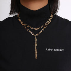 Elegant 18K gold-plated layered lariat necklace featuring a long chain and stylish link design.