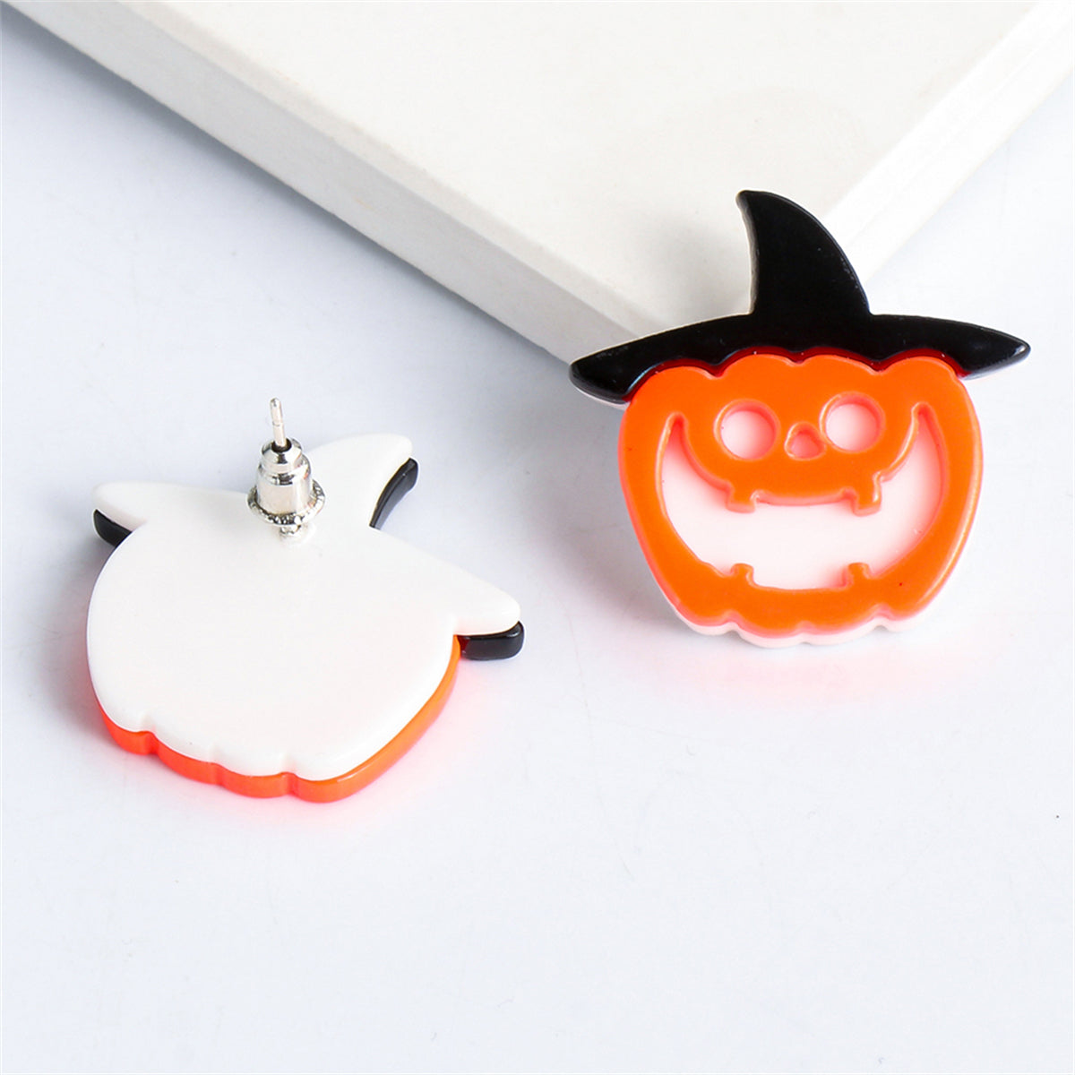 Orange Acrylic and Silver-Plated Pumpkin Witch Stud Earrings, silver stud earrings for women, everyday style, side view