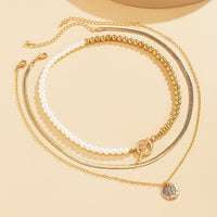 Pearl & Goldtone Toggle Necklace Set