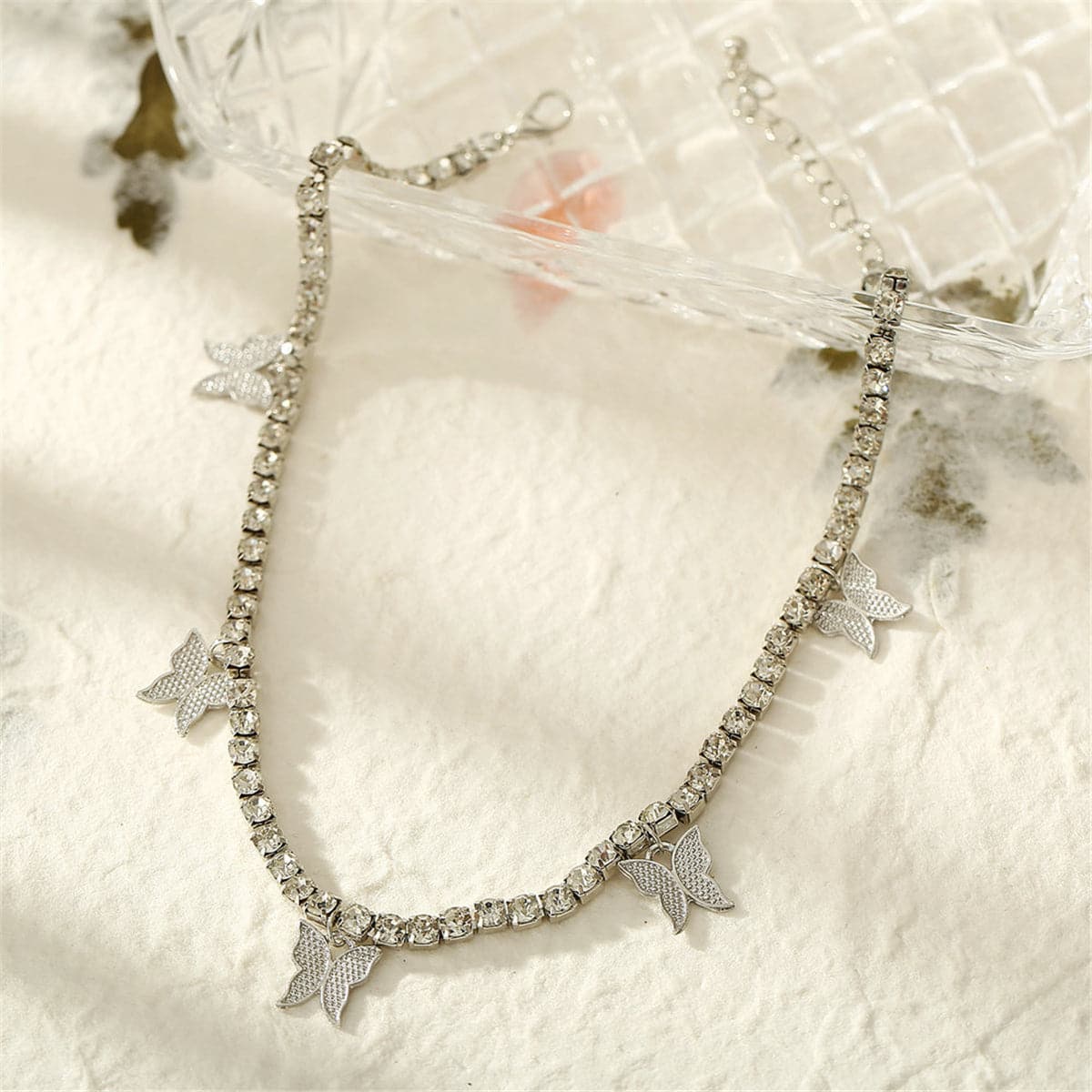 Cubic Zirconia and Silver-Plated Butterfly Station Choker Necklace, chunky silver choker necklace, side view