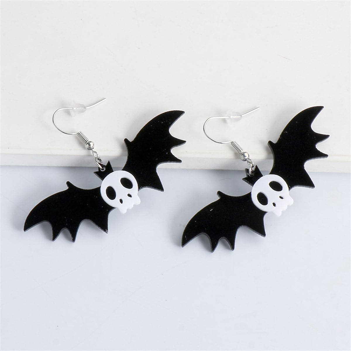 Black Acrylic and Silver-Plated Bat Drop Earrings, silver drop earrings for women, vintage-inspired design, lifestyle look