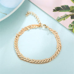 Exquisite gold chain bracelet adorned with a leaf design, crafted in 18K gold plating for a luxurious and stylish look.
