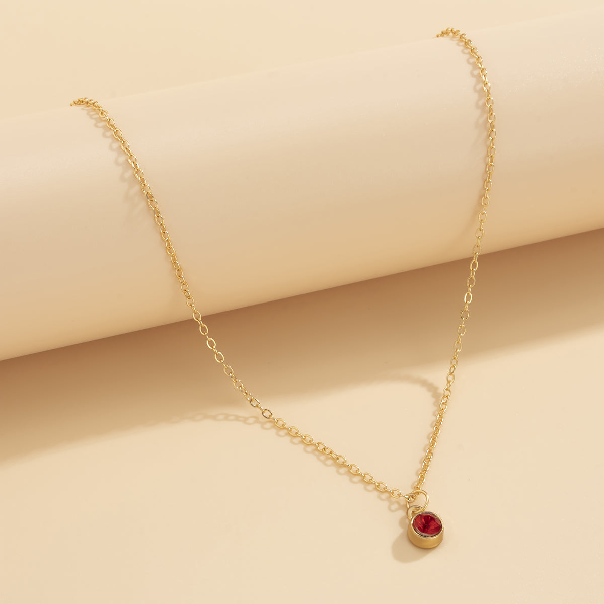 Red Cubic Zirconia and 18K Gold-Plated Round Bezel Pendant Necklace, gold pendant necklace for women, front view