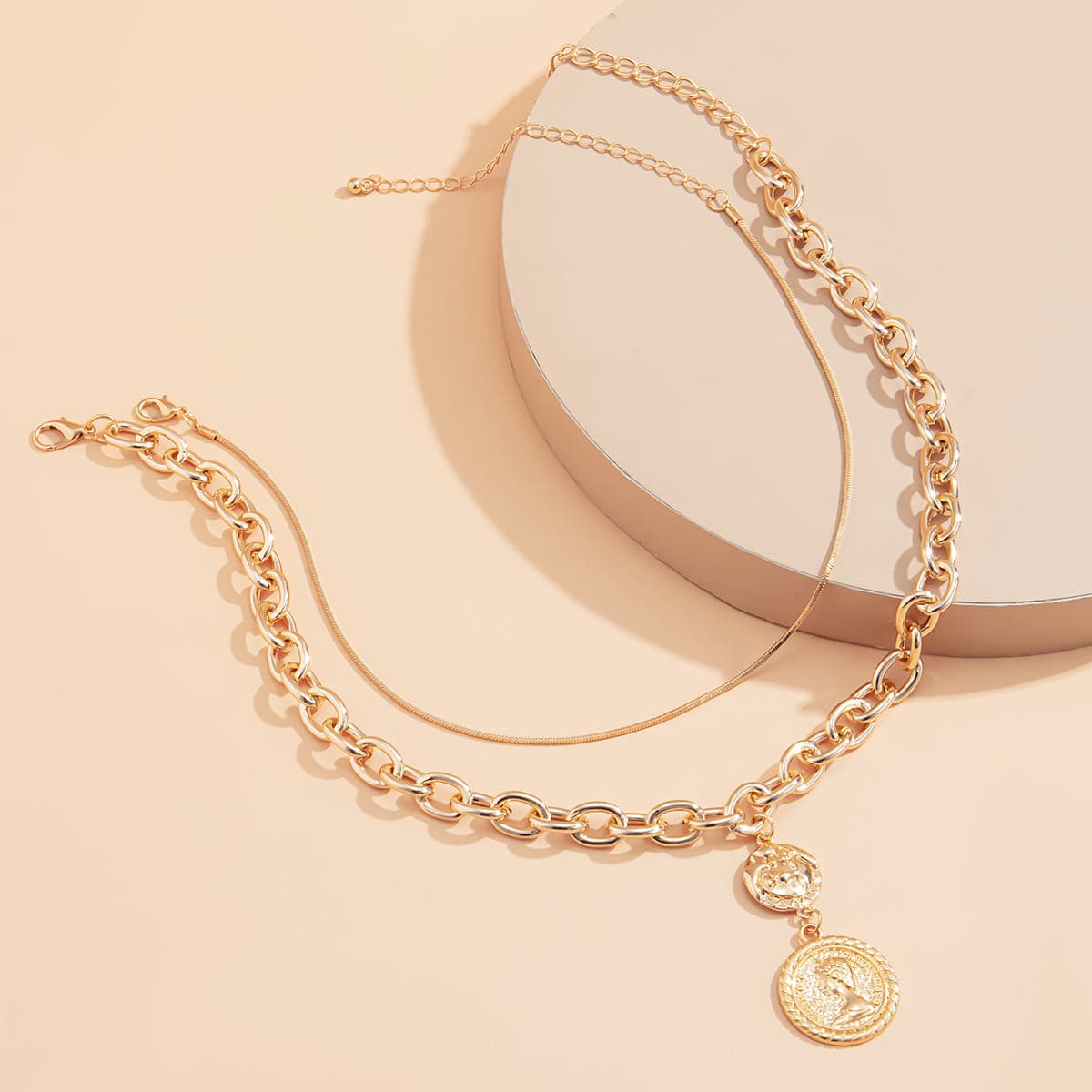 Dazzling 18K gold-plated necklace showcasing a beautiful coin charm, perfect for gifting or treating yourself to elegance.