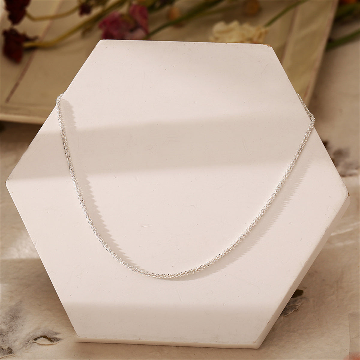 Silver-Plated Twist Choker, silver pendant necklace for women, dainty minimalist design, side view