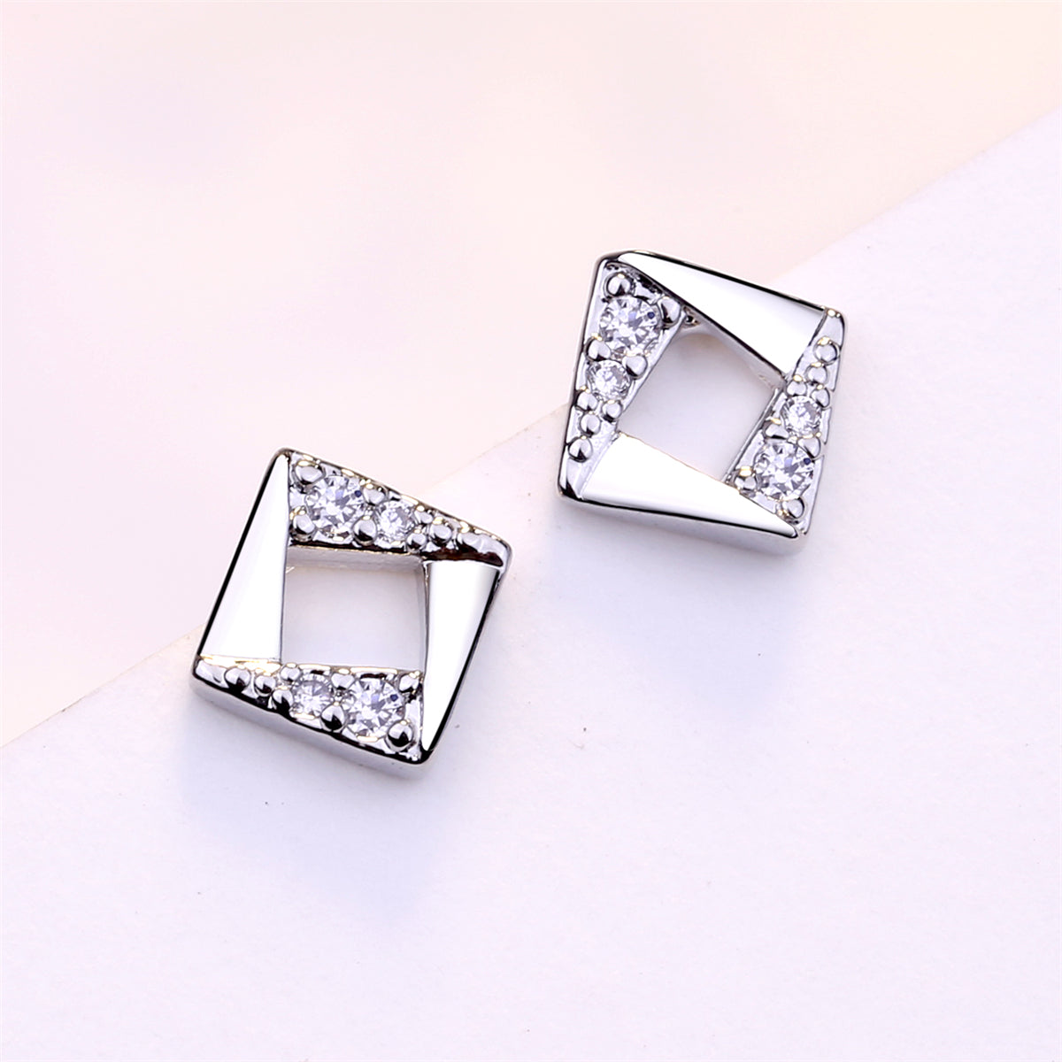 Cubic Zirconia and Silver-Plated Asymmetrical Rhombus Stud Earrings, silver stud earrings for women, front view