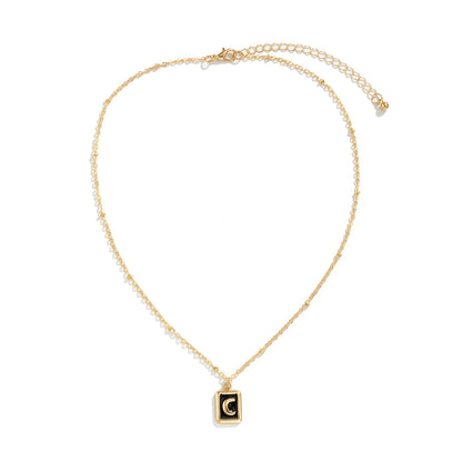 Black Enamel and 18K Gold-Plated Moon Card Pendant Necklace, gold pendant necklace for women, everyday style, side view