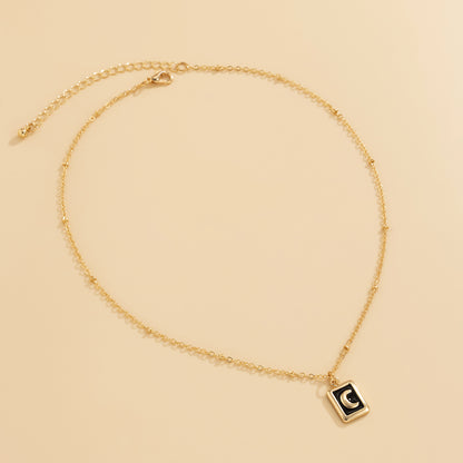 Black Enamel and 18K Gold-Plated Moon Card Pendant Necklace, gold pendant necklace for women, everyday style, lifestyle look