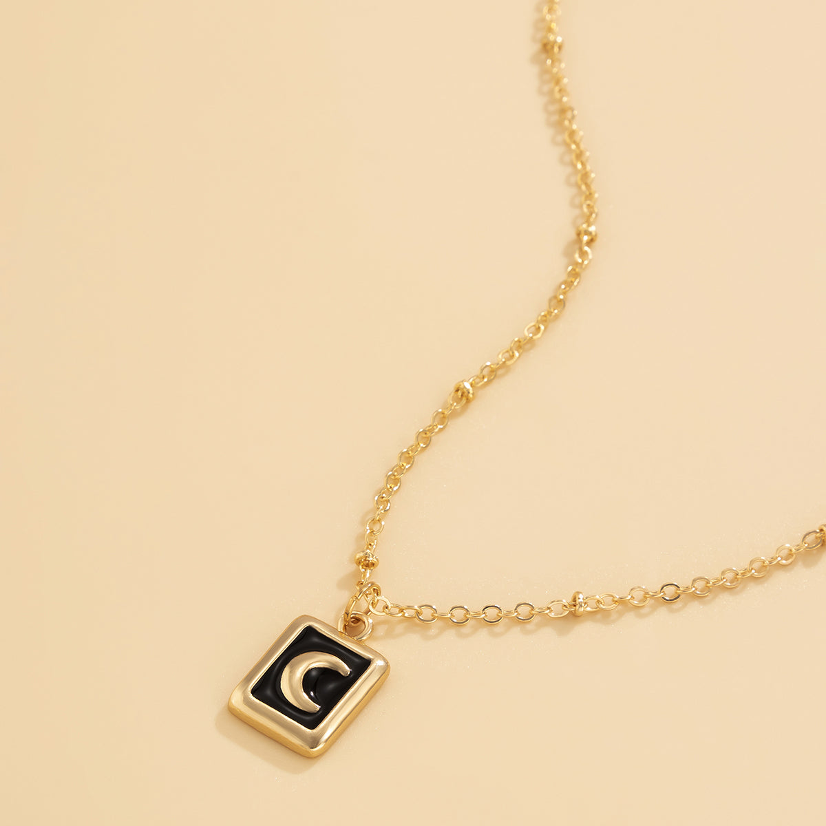 Black Enamel and 18K Gold-Plated Moon Card Pendant Necklace, gold pendant necklace for women, everyday style, front view
