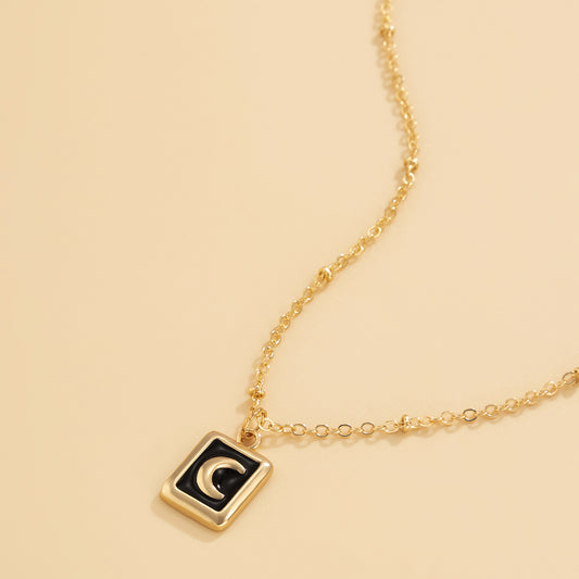 Black Enamel and 18K Gold-Plated Moon Card Pendant Necklace, gold pendant necklace for women, everyday style, front view
