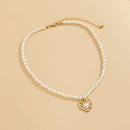 Pearl and 18K Gold-Plated Wrinkled Heart Pendant Necklace, gold pendant necklace for women, detail close-up