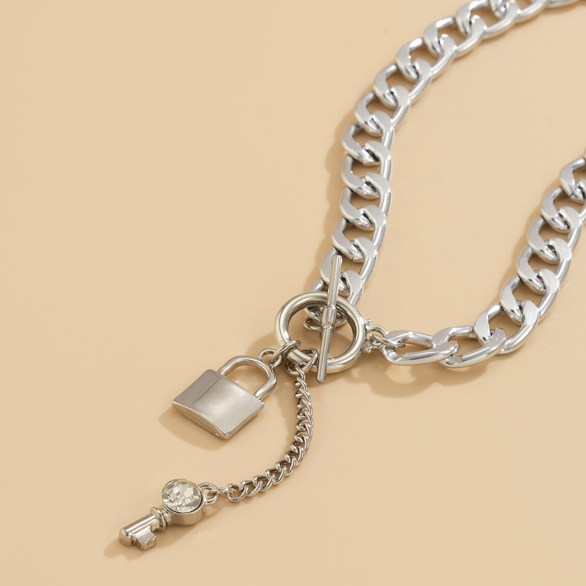 Cubic Zirconia and Silver-Plated Lock Chain Necklace, silver pendant necklace for women, everyday style, detail close-up