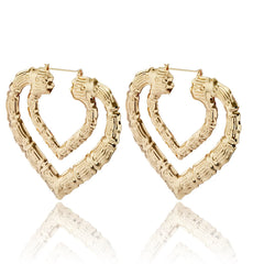 Stunning heart-shaped earrings crafted from bamboo, beautifully plated in 18K gold for a chic look.