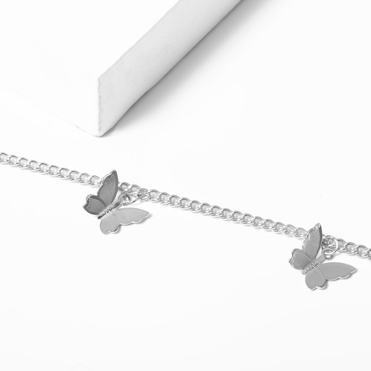 Silver-Plated Butterfly Station Choker Necklace, silver pendant necklace for women, everyday style, side view