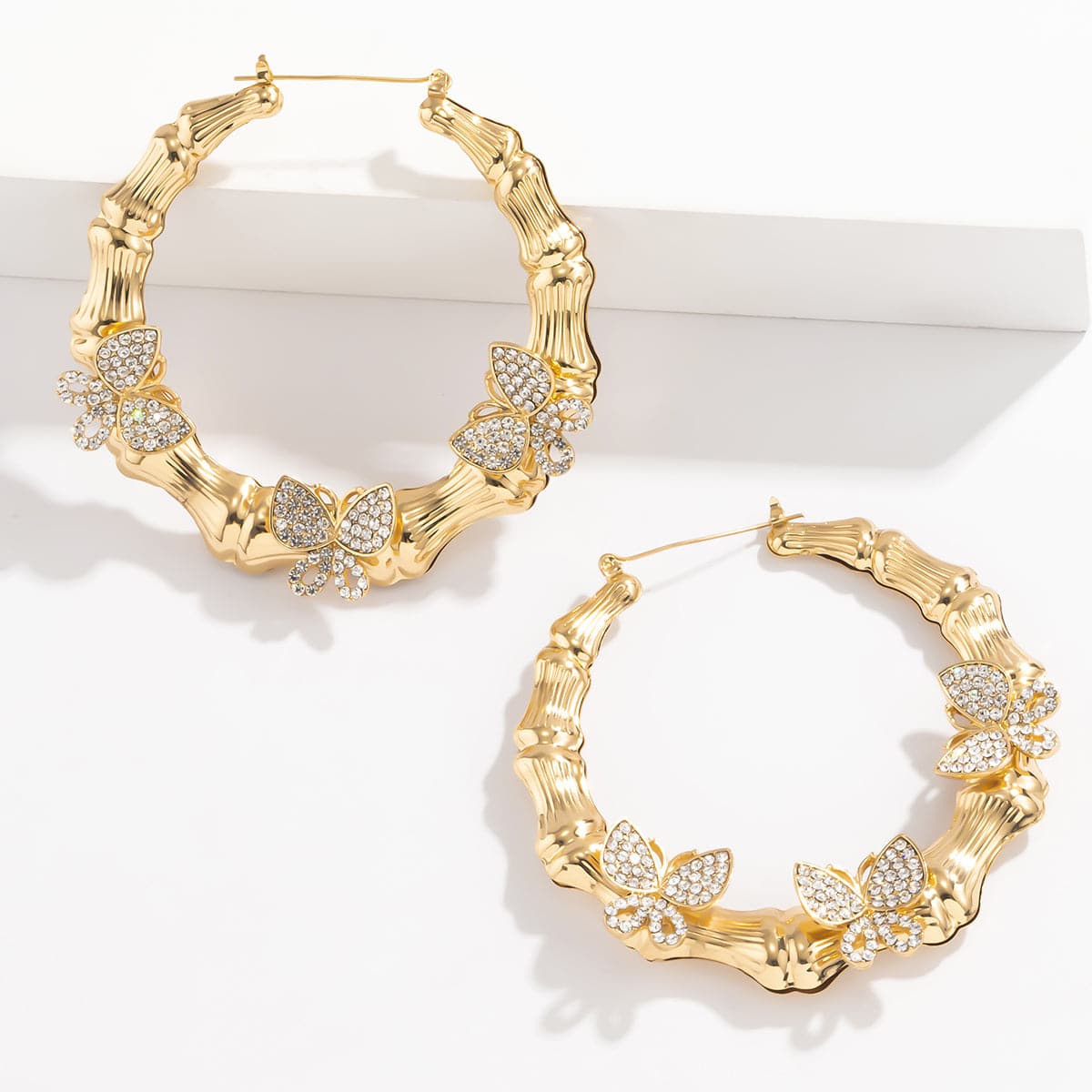 Cubic Zirconia and 18K Gold-Plated Butterfly Bamboo Hoop Earrings, botanical inspired, detail close-up