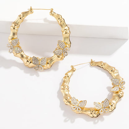Cubic Zirconia and 18K Gold-Plated Butterfly Bamboo Hoop Earrings, botanical inspired, detail close-up