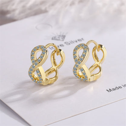 Cubic Zirconia and 18K Gold-Plated Infinity Huggie Earrings, gold huggie earrings, dainty minimalist design, front view