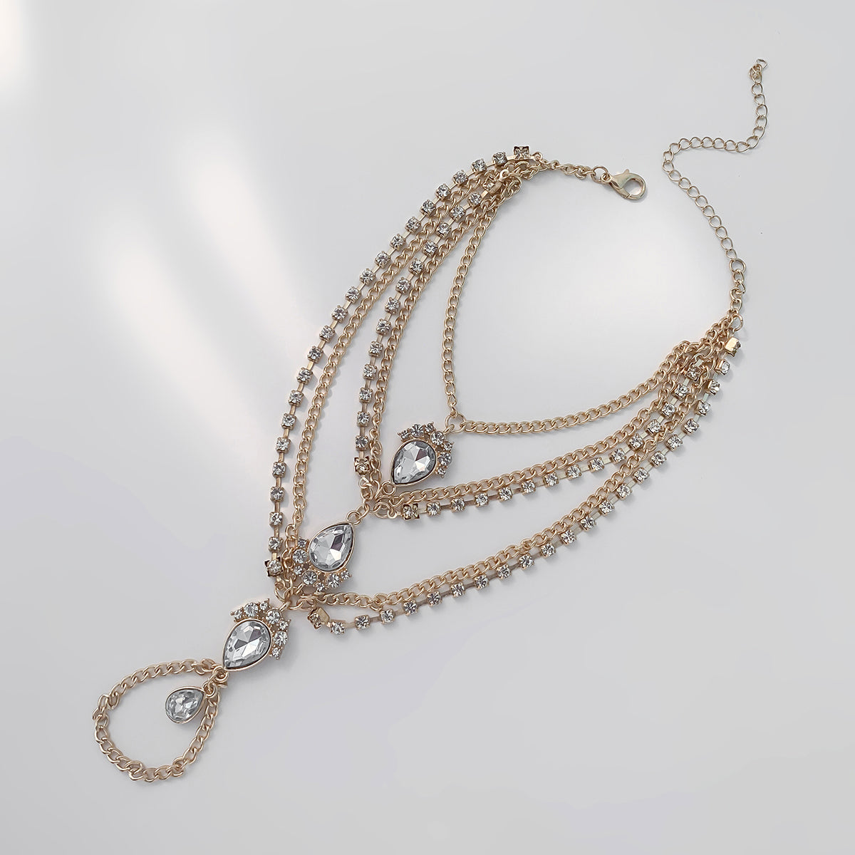 Cubic Zirconia and Crystal 18K Gold-Plated Layered Toe Ring Anklet, gold statement rings for women, detail close-up