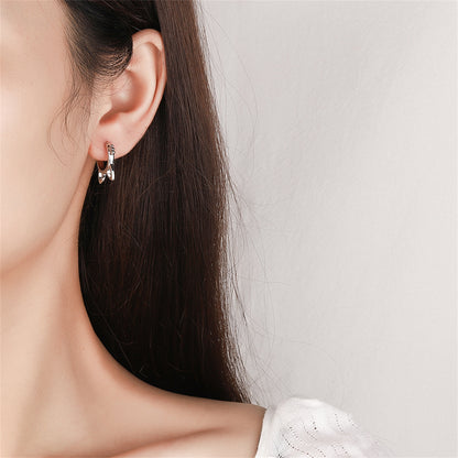 Silver-Plated Cat-Shape Huggie Earrings, silver huggie earrings, vintage-inspired design, lifestyle look