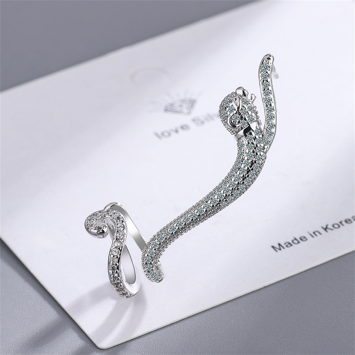 Cubic Zirconia and Silver-Plated Leopard Ear Climber, silver stud earrings for women, everyday style, detail close-up