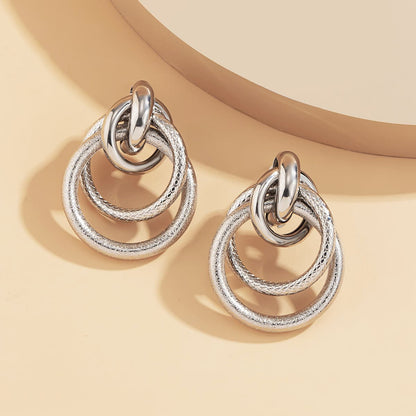 Silver-Plated Layered Circles Drop Earrings, silver drop earrings for women, dainty minimalist design, lifestyle look