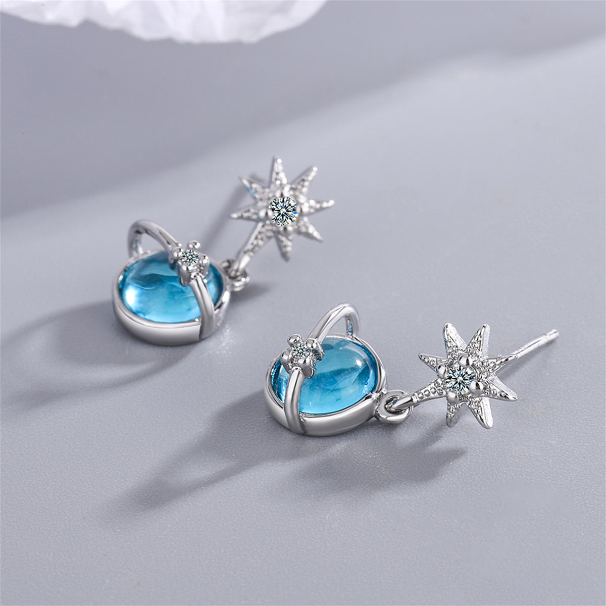 Moonstone and Cubic Zirconia Star and Planet Drop Earrings, drop earrings for women, botanical inspired, detail close-up