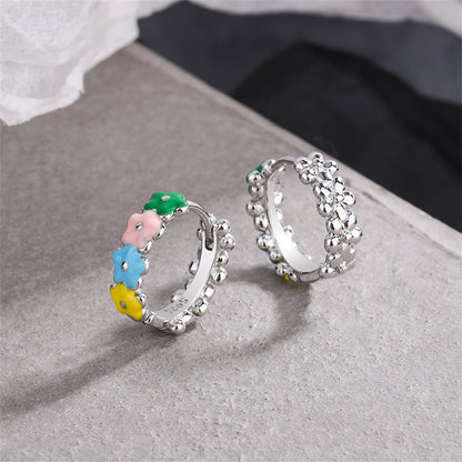 Pink and Yellow Enamel Silver-Plated Flower Huggie Earrings, silver huggie earrings, everyday style, lifestyle look