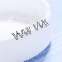 Cubic Zirconia & Silvertone Wave Stud Earrings