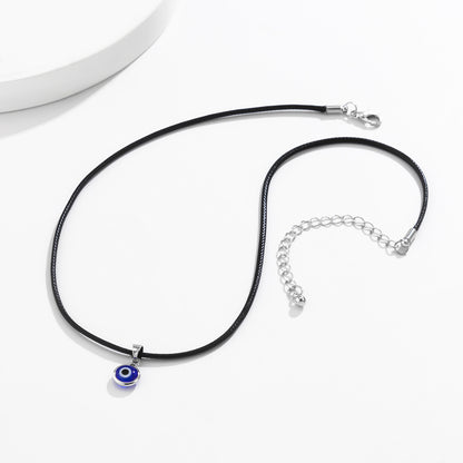 Blue Acrylic and Silver-Plated Evil Eye Pendant Necklace, silver pendant necklace for women, detail close-up