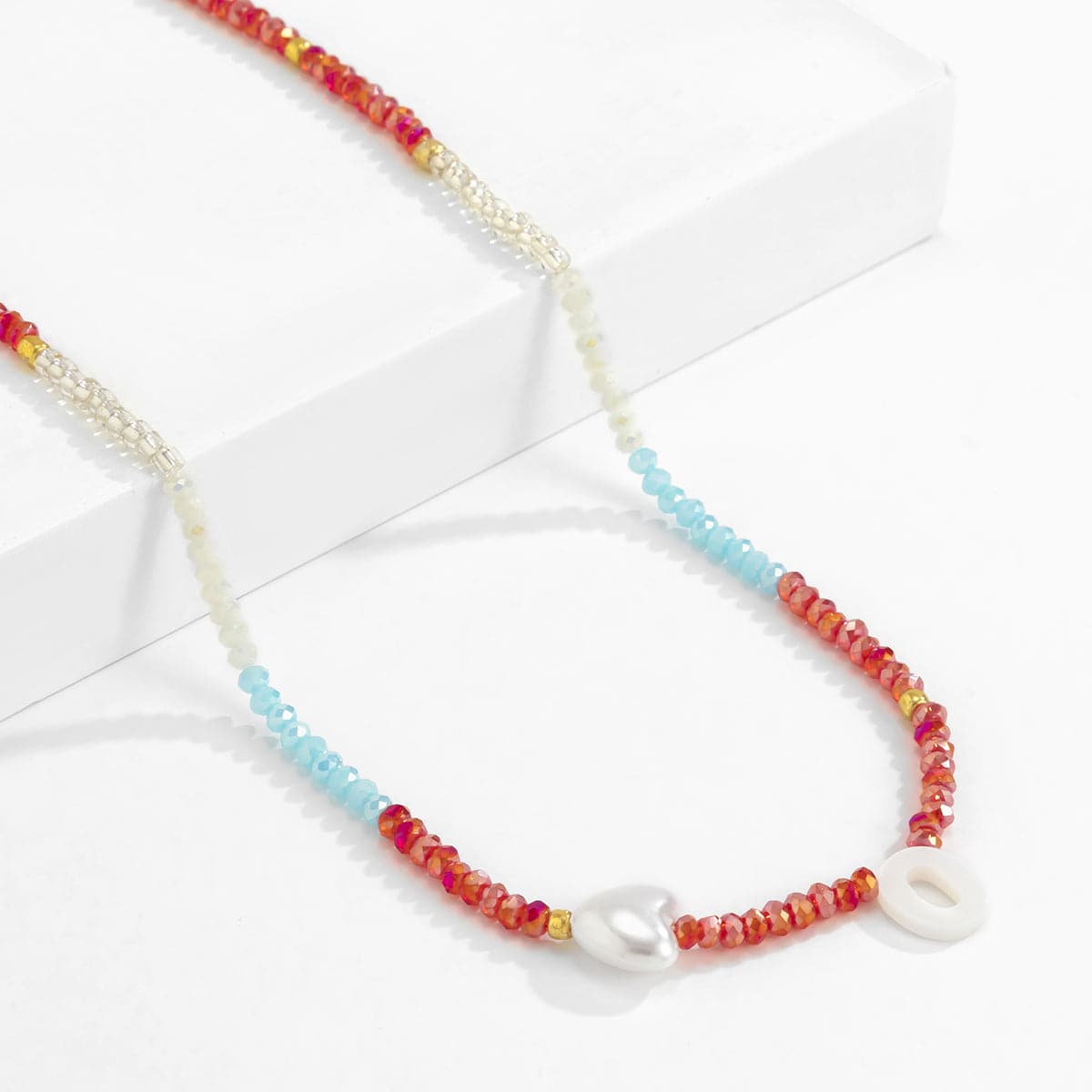 Red and Blue Acrylic Pearl 18K Gold-Plated Heart Necklace, gold pendant necklace for women, everyday style, side view