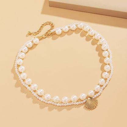Pearl and 18K Gold-Plated Shell Layered Necklace, gold pendant necklace for women, vintage-inspired design, lifestyle look