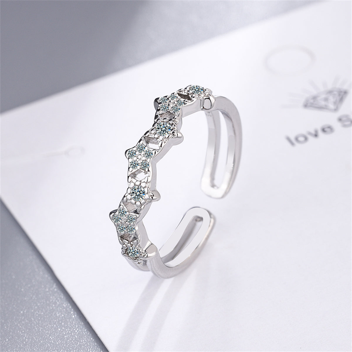 Cubic Zirconia and Silver-Plated Linked Star Open Band Ring, silver statement rings for women, botanical inspired, front view
