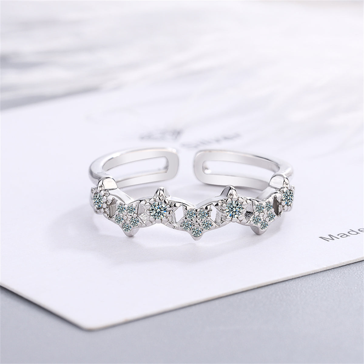 Cubic Zirconia and Silver-Plated Linked Star Open Band Ring, silver statement rings for women, detail close-up