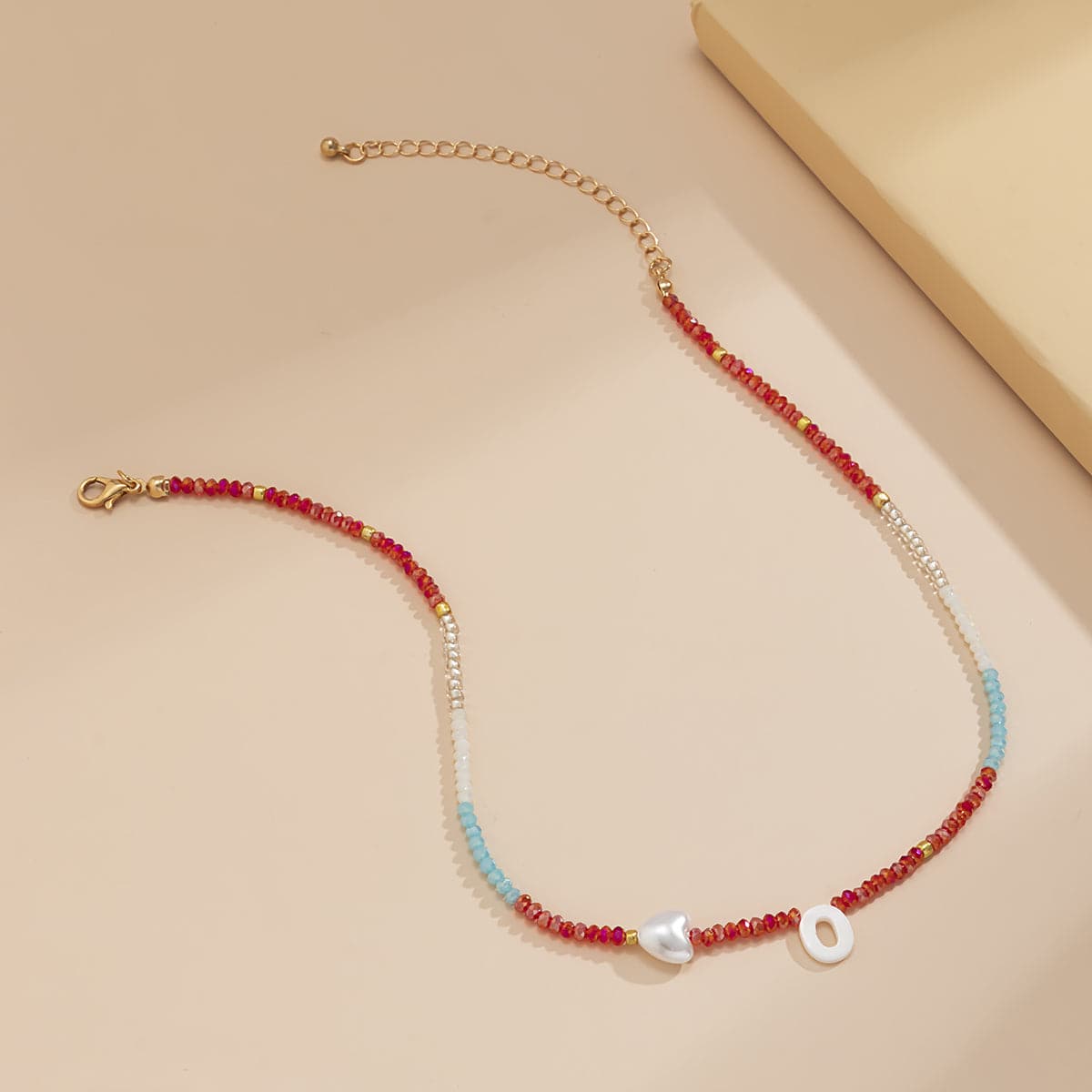 Red and Blue Acrylic Pearl 18K Gold-Plated Heart Necklace, gold pendant necklace for women, everyday style, detail close-up