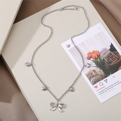 Silver-Plated Bow Heart Station Necklace