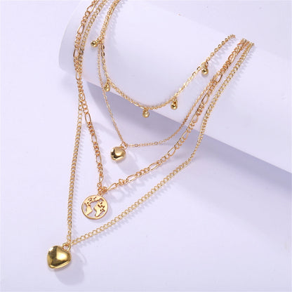 18K Gold-Plated Heart Map Layered Pendant Necklace, gold pendant necklace for women, dainty minimalist design, lifestyle look