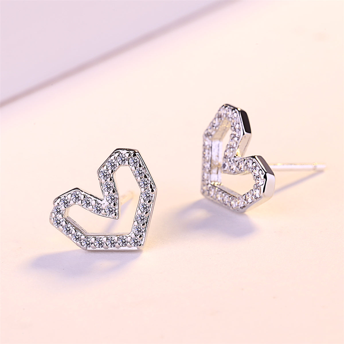 Cubic Zirconia and Silver-Plated Hexagon Heart Stud Earrings, silver stud earrings for women, detail close-up