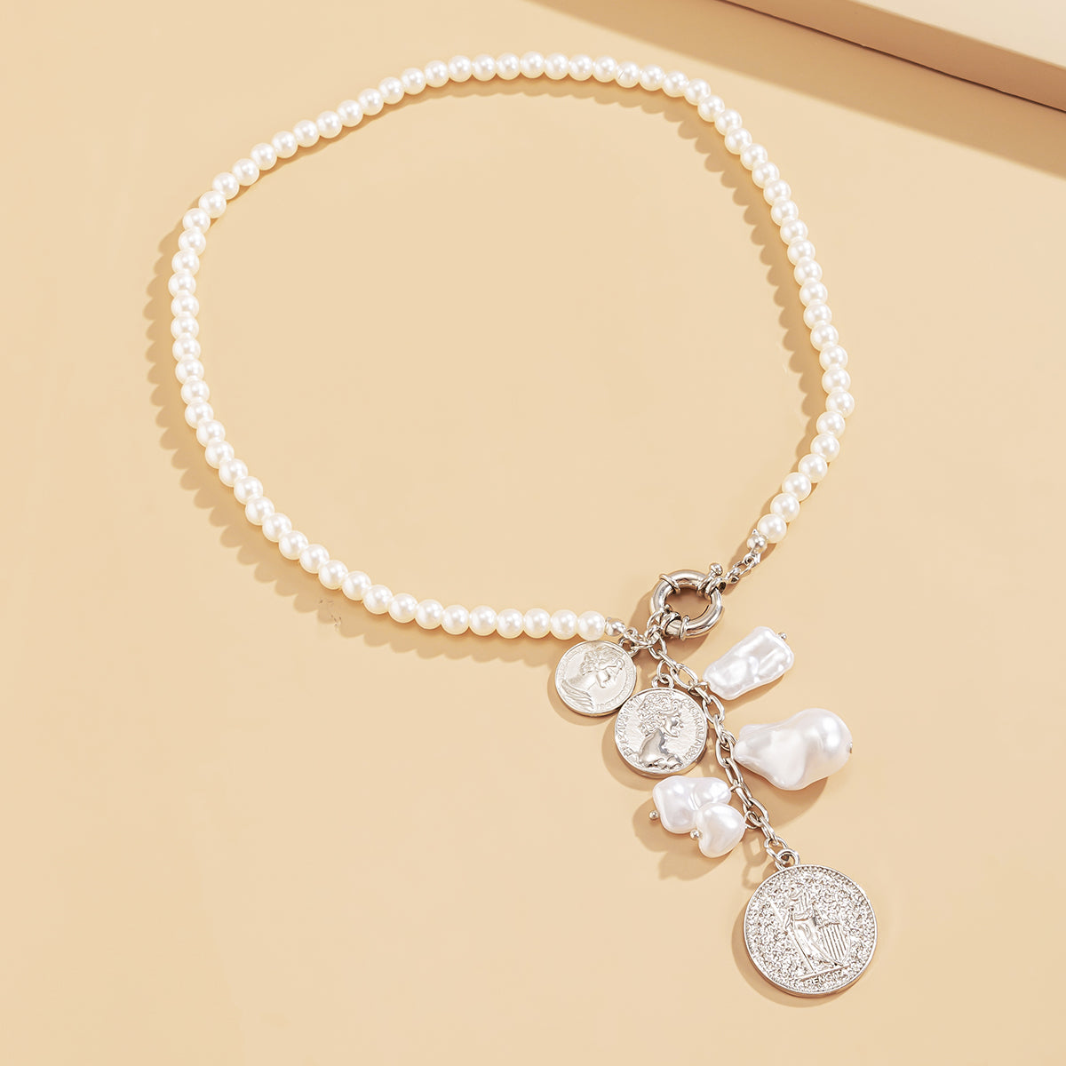Pearl and Silver-Plated Coin Drop Necklace, silver pendant necklace for women, vintage-inspired design, lifestyle look