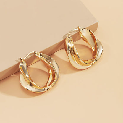 18K Gold-Plated Twist Huggie Earrings, gold huggie earrings, dainty minimalist design, lifestyle look