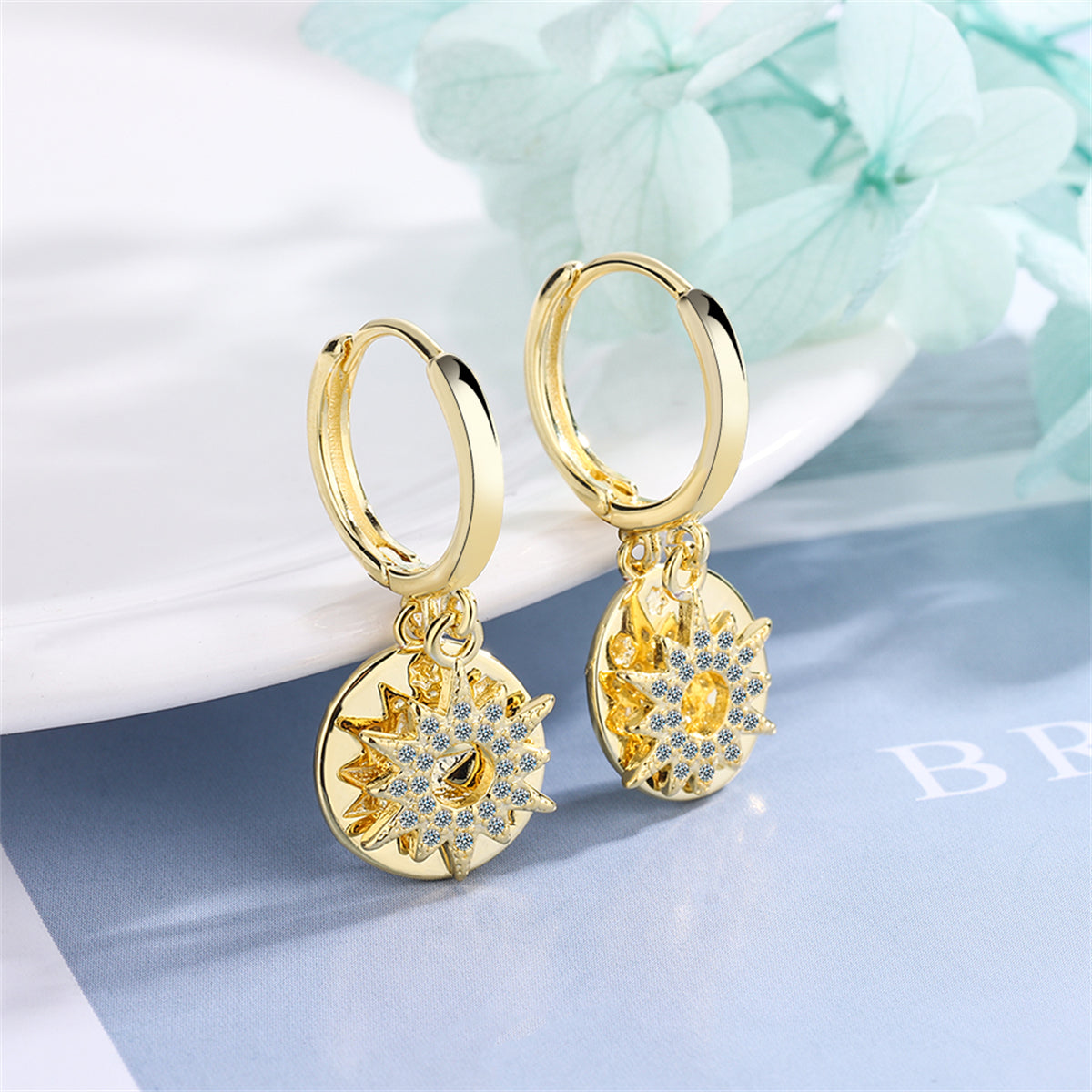 Cubic Zirconia and 18K Gold-Plated Sun Huggie Earrings, gold huggie earrings, dainty minimalist design, detail close-up