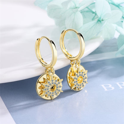 Cubic Zirconia and 18K Gold-Plated Sun Huggie Earrings, gold huggie earrings, dainty minimalist design, detail close-up